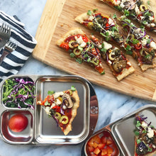 Load image into Gallery viewer, A slice of pizza is served on a kids stainless steel divided tray with tomato and mixed green salad on the side.
